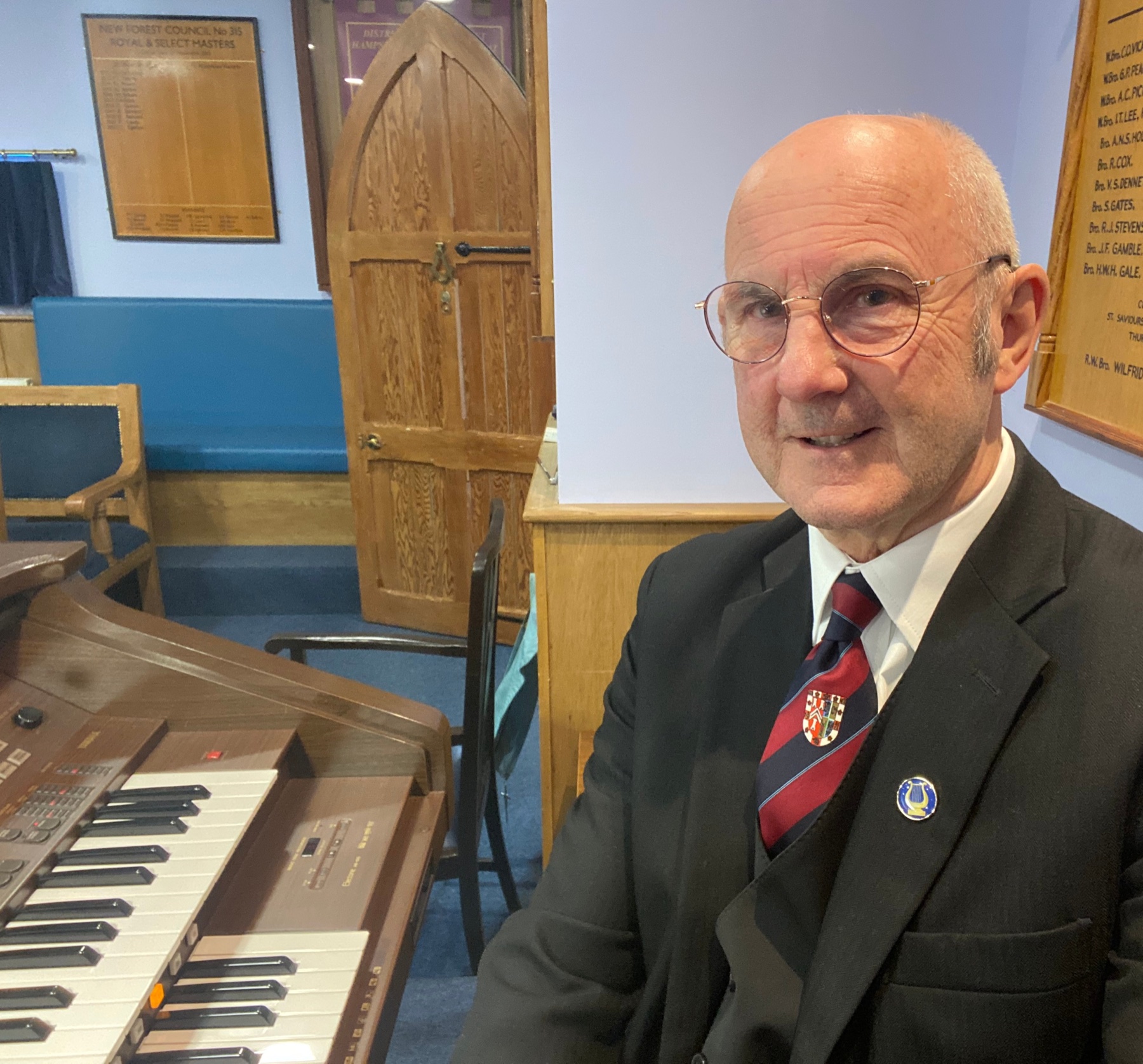Andrew Ferguson seated at an organ